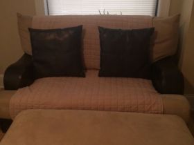 Accent pillows and sofa cover included